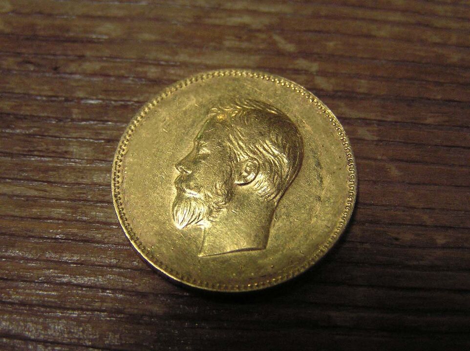 gold coin for economic well-being