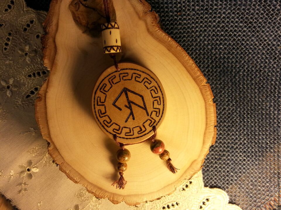 amulet with a rune for good luck photo 1